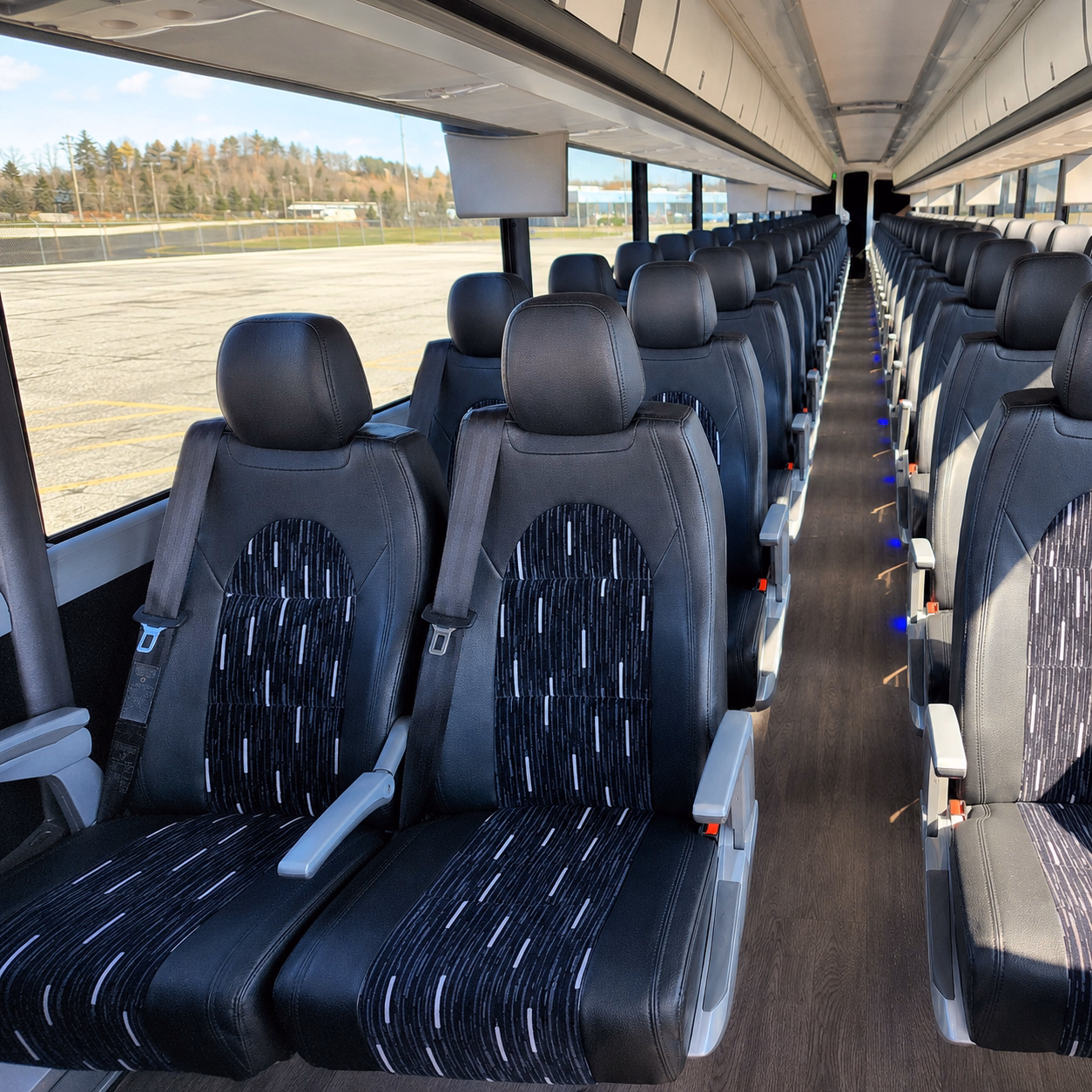 rochester charter bus rentals for airport transfers